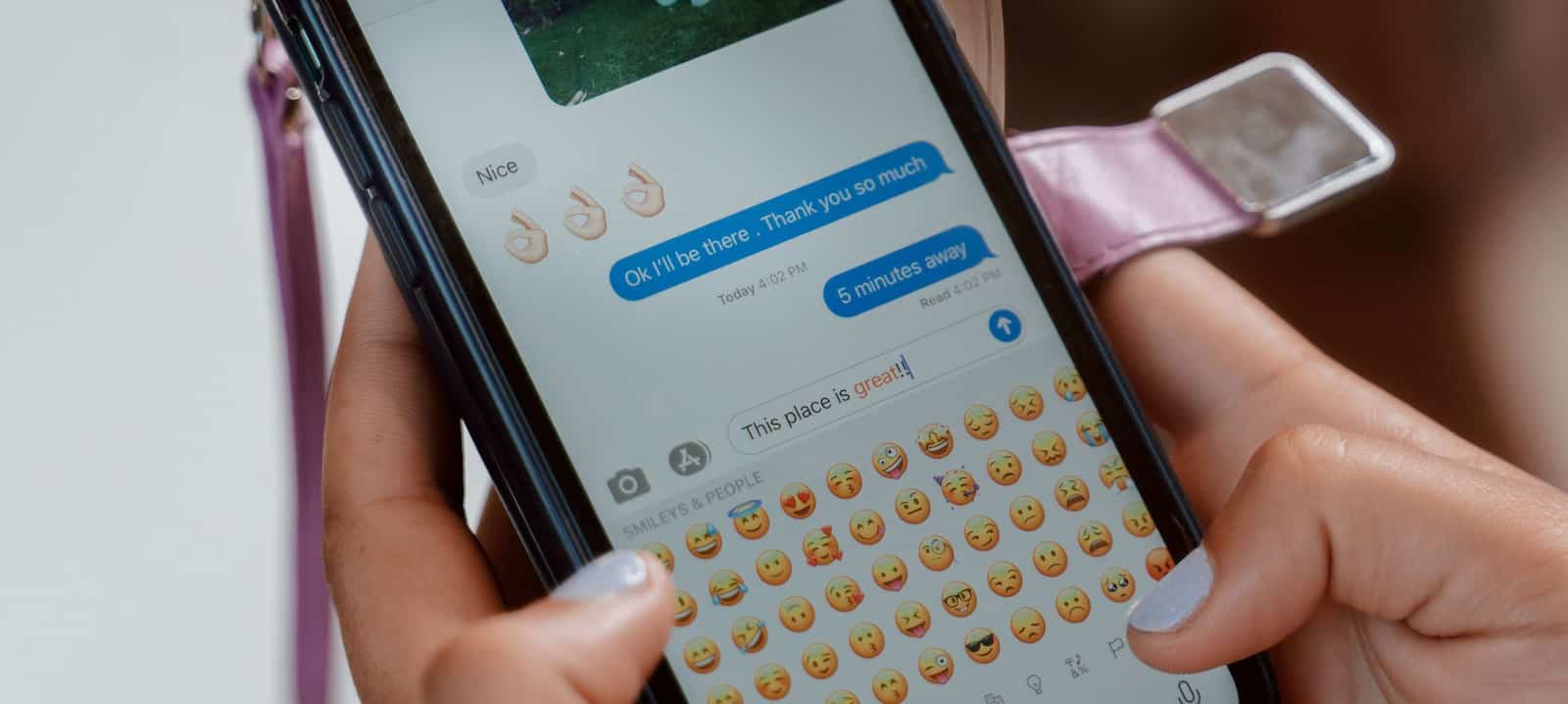 Positive online behavior and interactions with hearts and likes in a chat scene on a laptop.