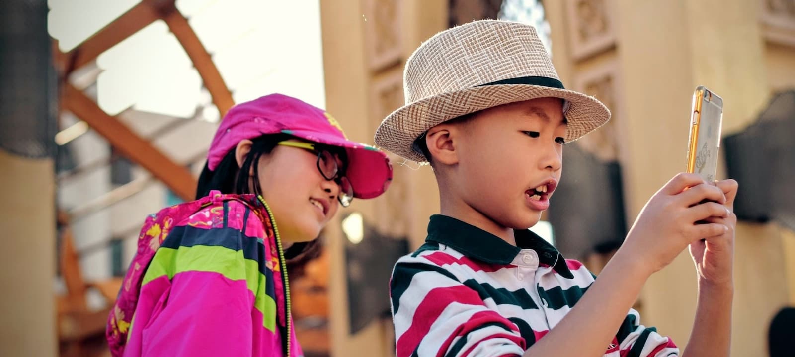 A child staring at screens.