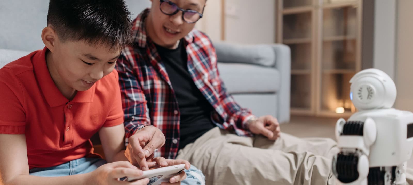 A parent and child fact-checking information online.