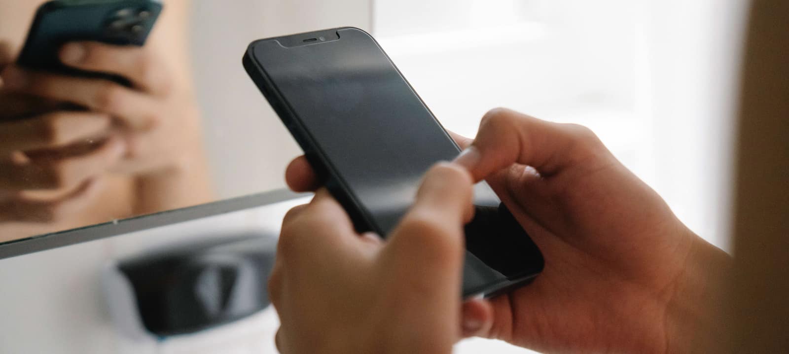 person holding handphone image
