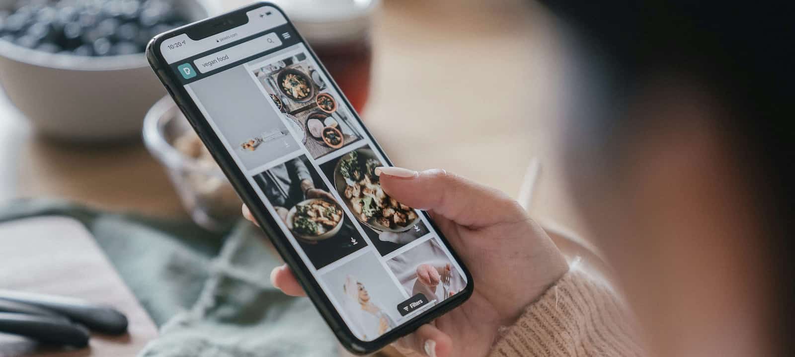 person looking on the gallery on their phone